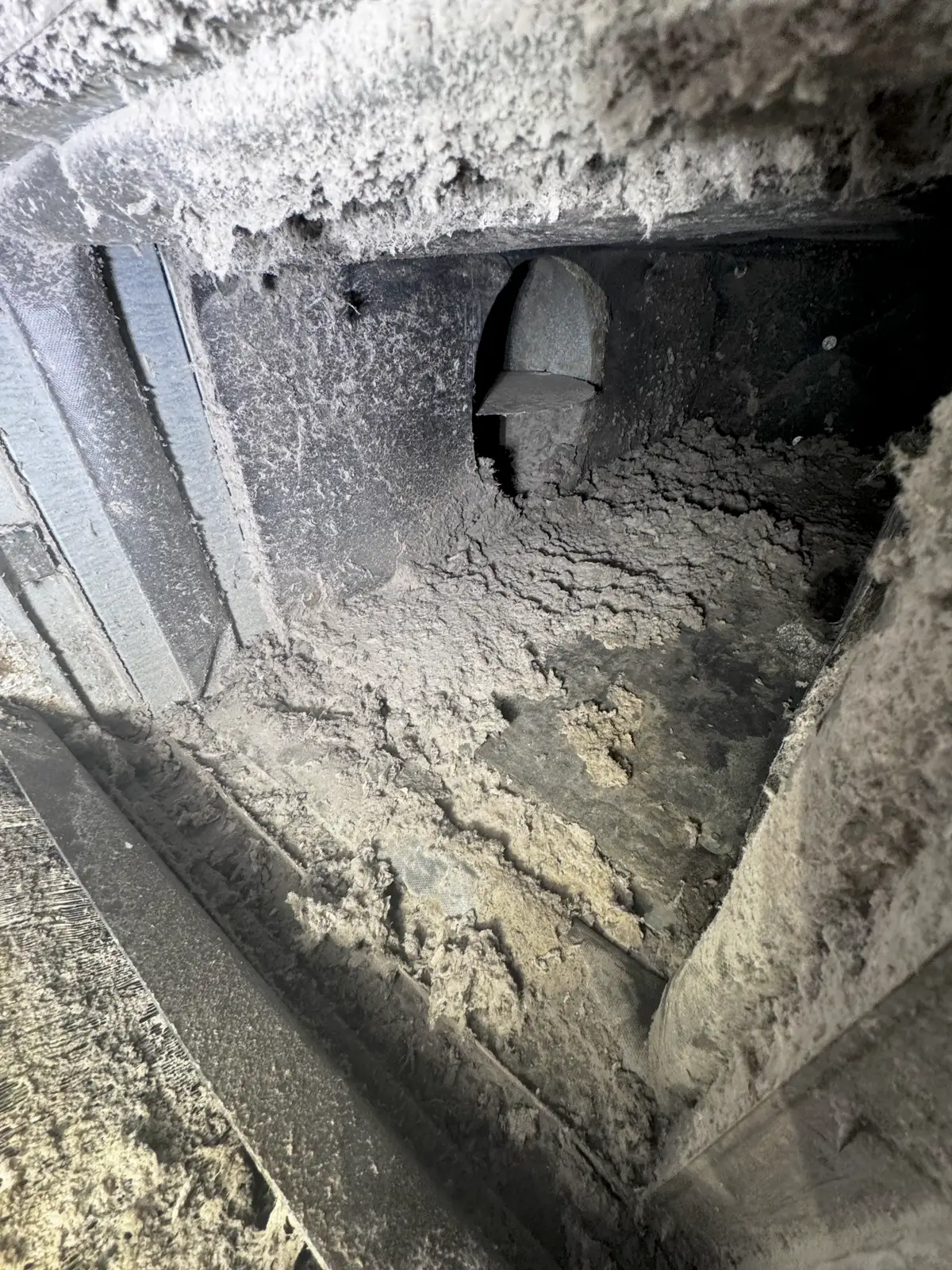 Hotel supply duct before cleaning — thick dust layer inside Courtyard by Marriott Portland Downtown