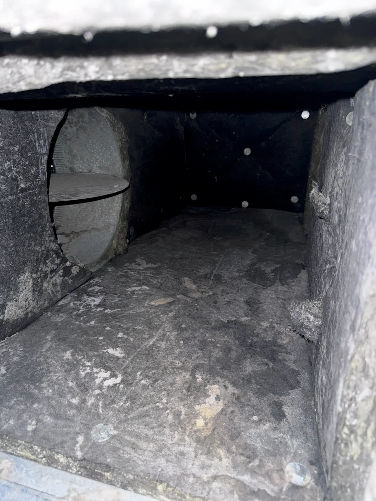 Same hotel supply duct after NWBreeze cleaning — clean metal surface