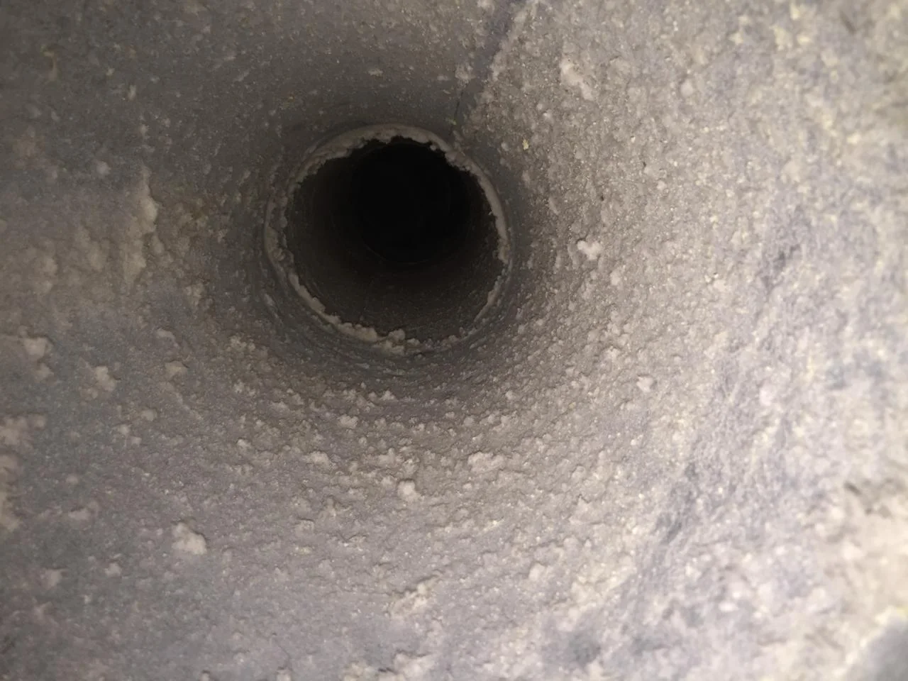 Internal duct before cleaning — thick accumulation
