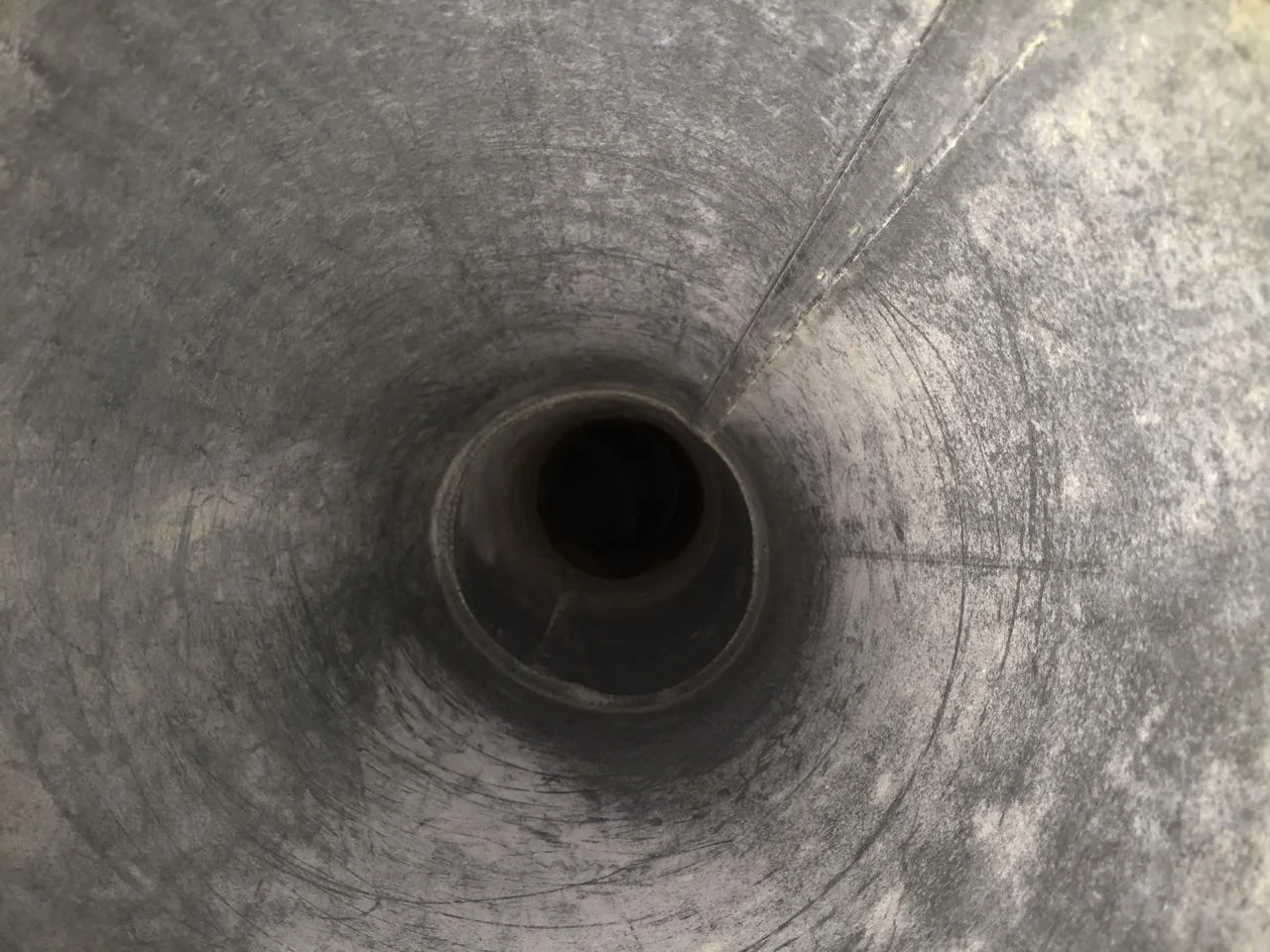 Internal duct after cleaning — restored to bare metal