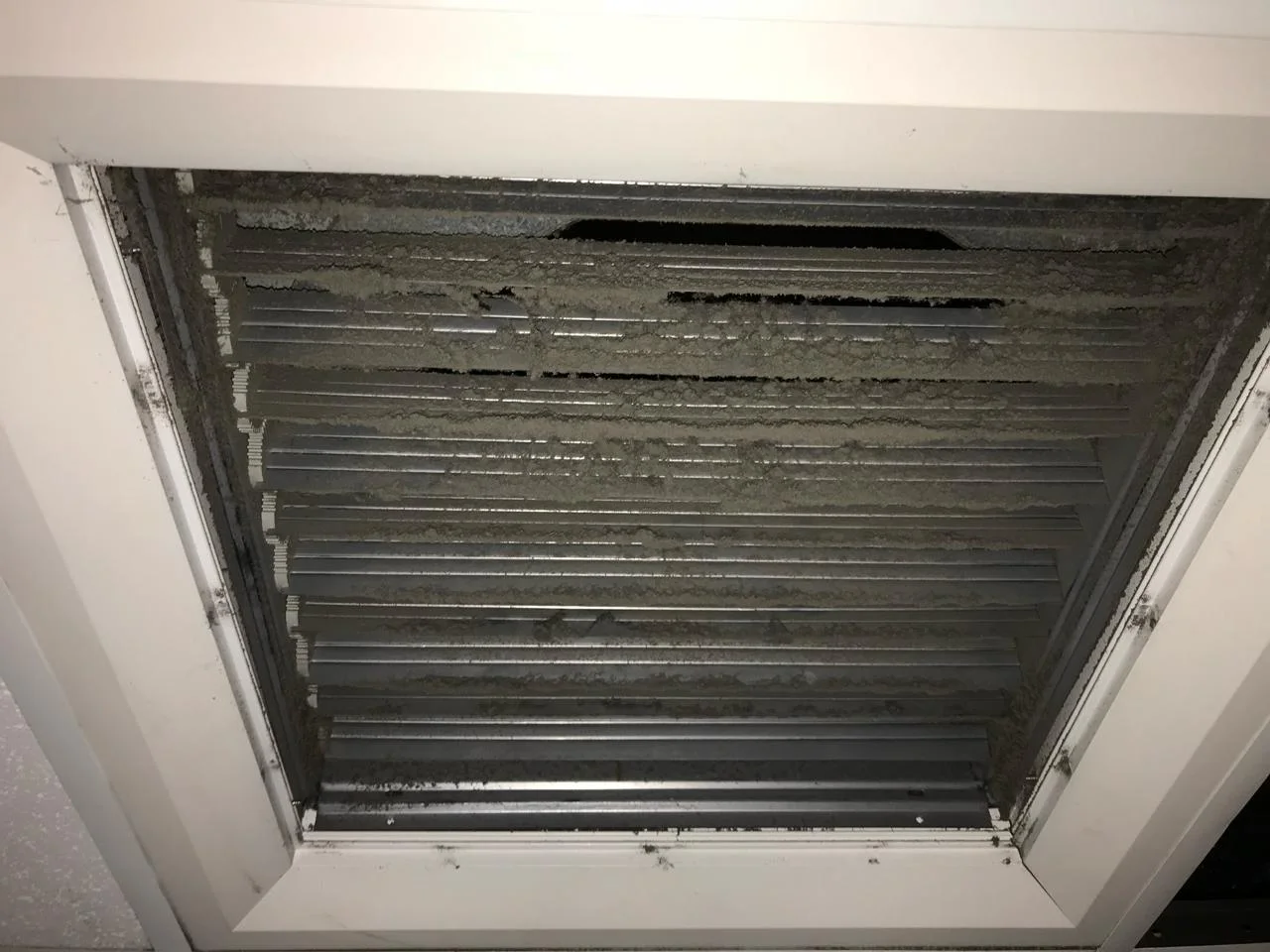 Second jail duct before cleaning — clogged with contaminants