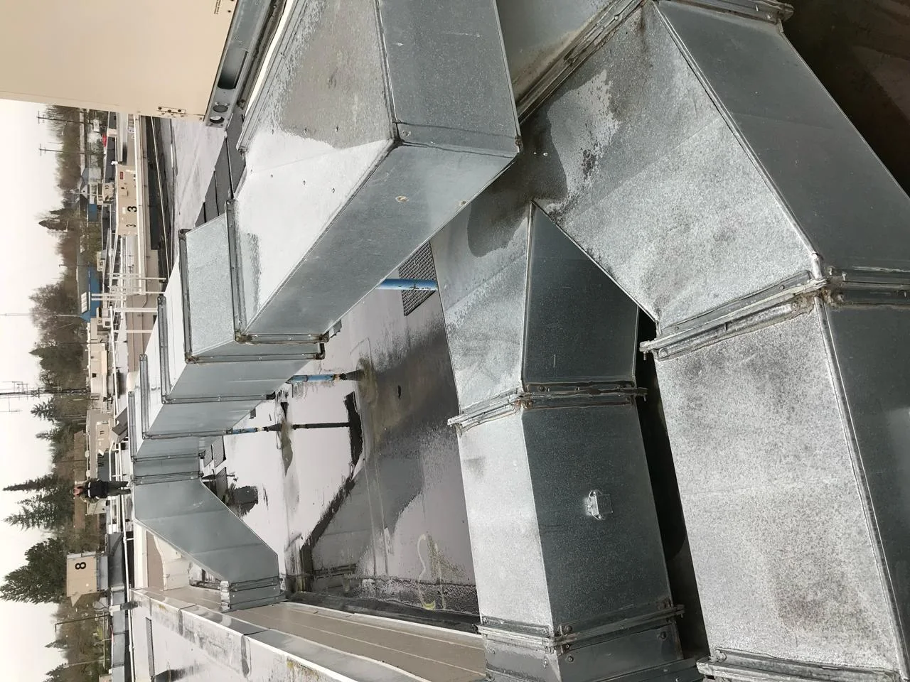 Large commercial ductwork and rooftop equipment at Linn County Jail, Albany