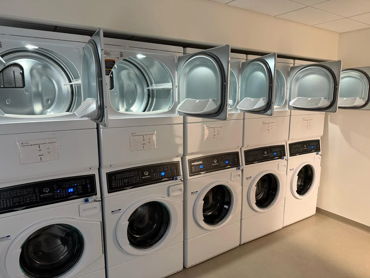 Dryer machines at Springs Living Apartments Vancouver — full fleet serviced by North West Breeze